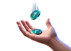 Hand holding USDT coins